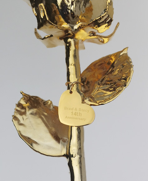 engraved heart tag on rose